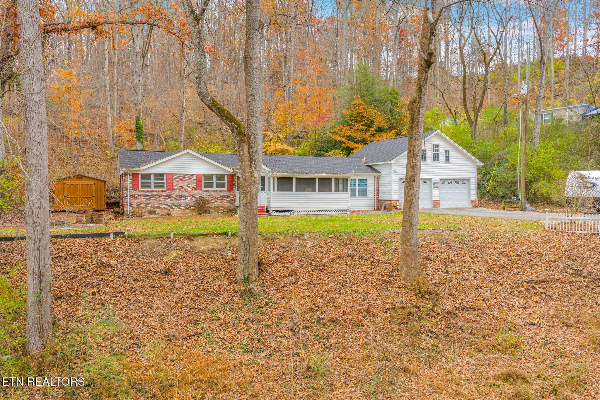 8404 Brickyard Road Powell, TN 37849 - Photo 4 of 49 a view of a house with a swimming pool