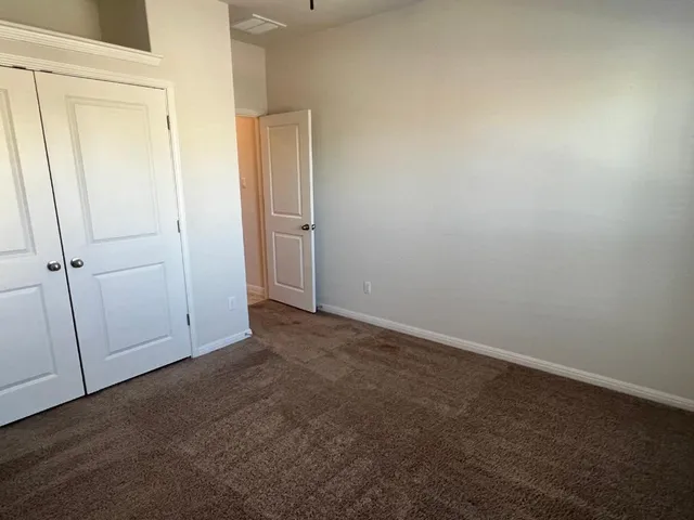 a view of hallway with stairs