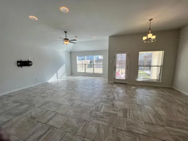 an empty room with closet area