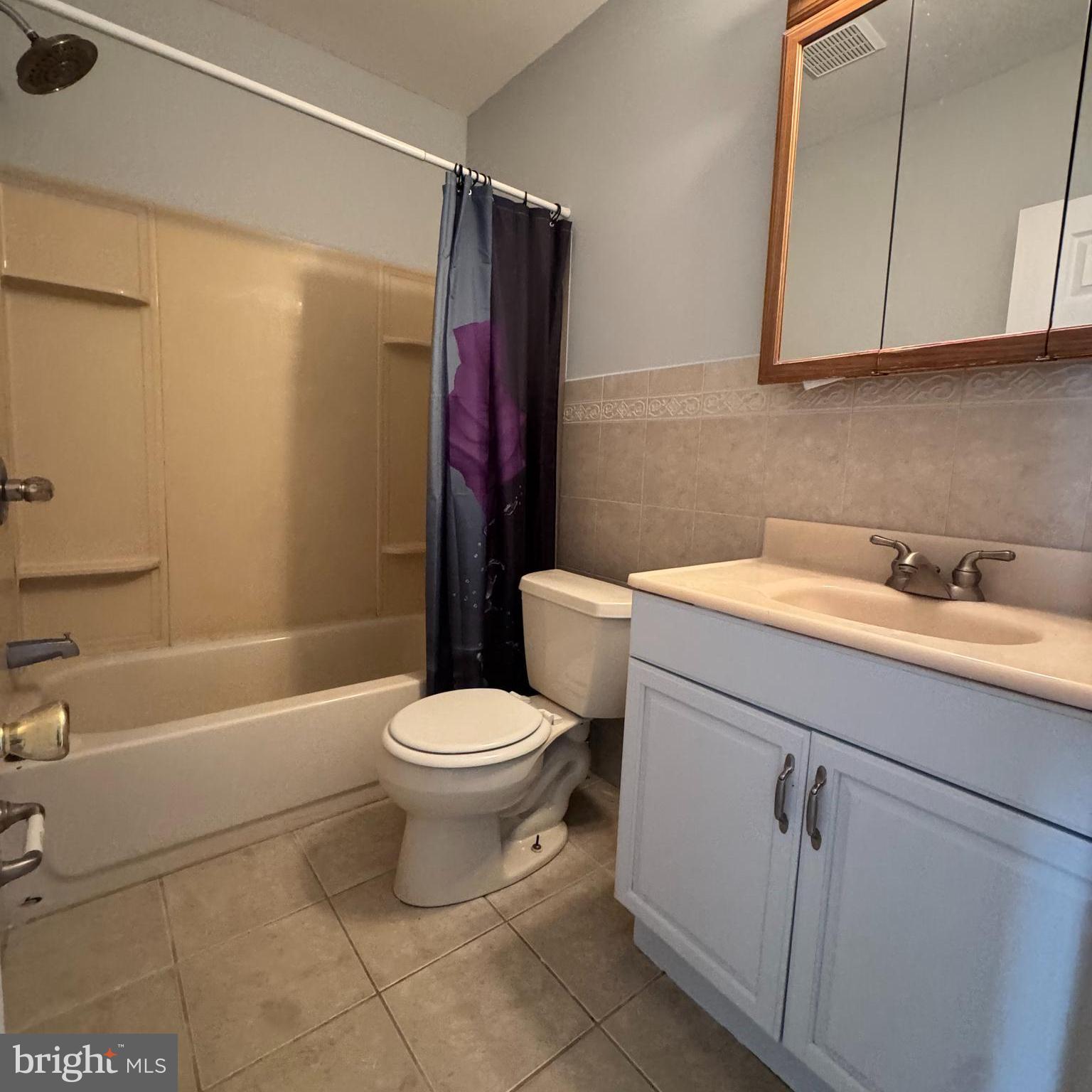 3276 Webb Street Philadelphia, PA 19134 - Photo 9 of 9 a bathroom with a sink toilet and shower