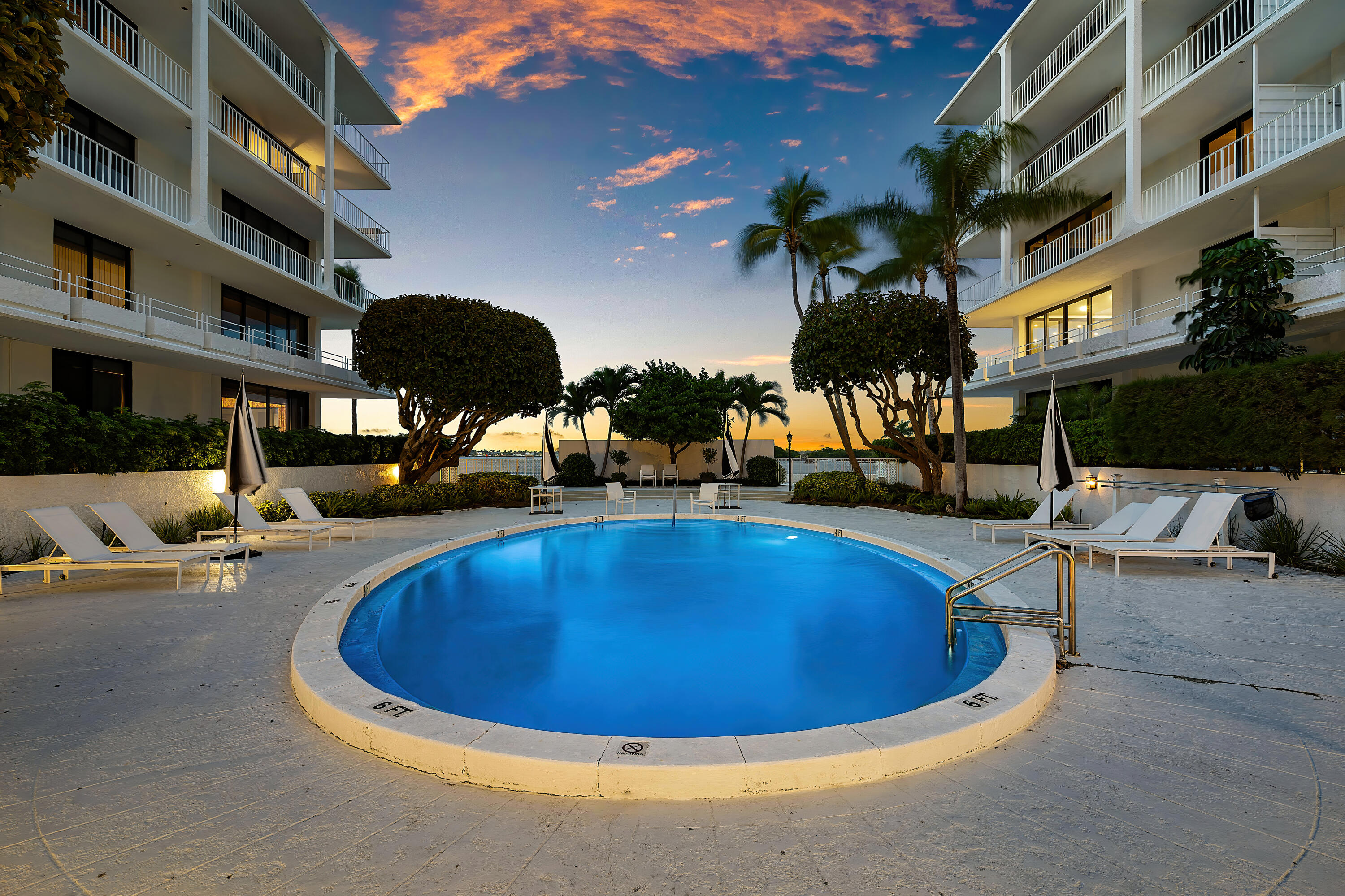2150 Ibis Isle Road, Unit 8 Palm Beach, FL 33480 - Photo 22 of 29 Towers Pool at Dusk