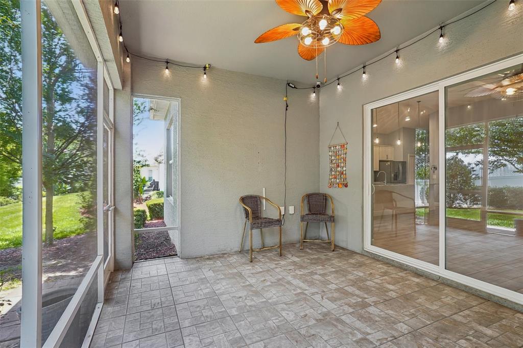 10339 Addison Shore Way Oxford, FL 34484 - Photo 51 of 54 a view of an empty room and glass door