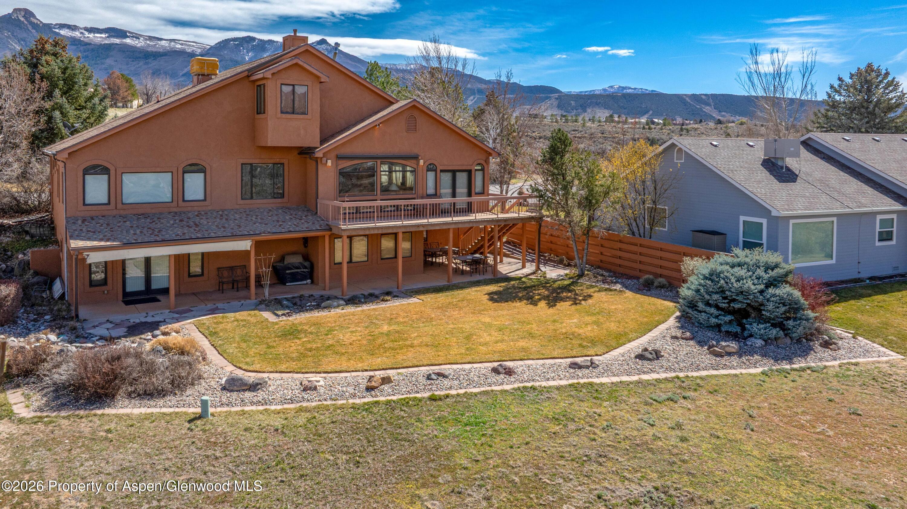 71 River View Place Parachute, CO 81635 - Photo 2 of 45 a view of a house with swimming pool