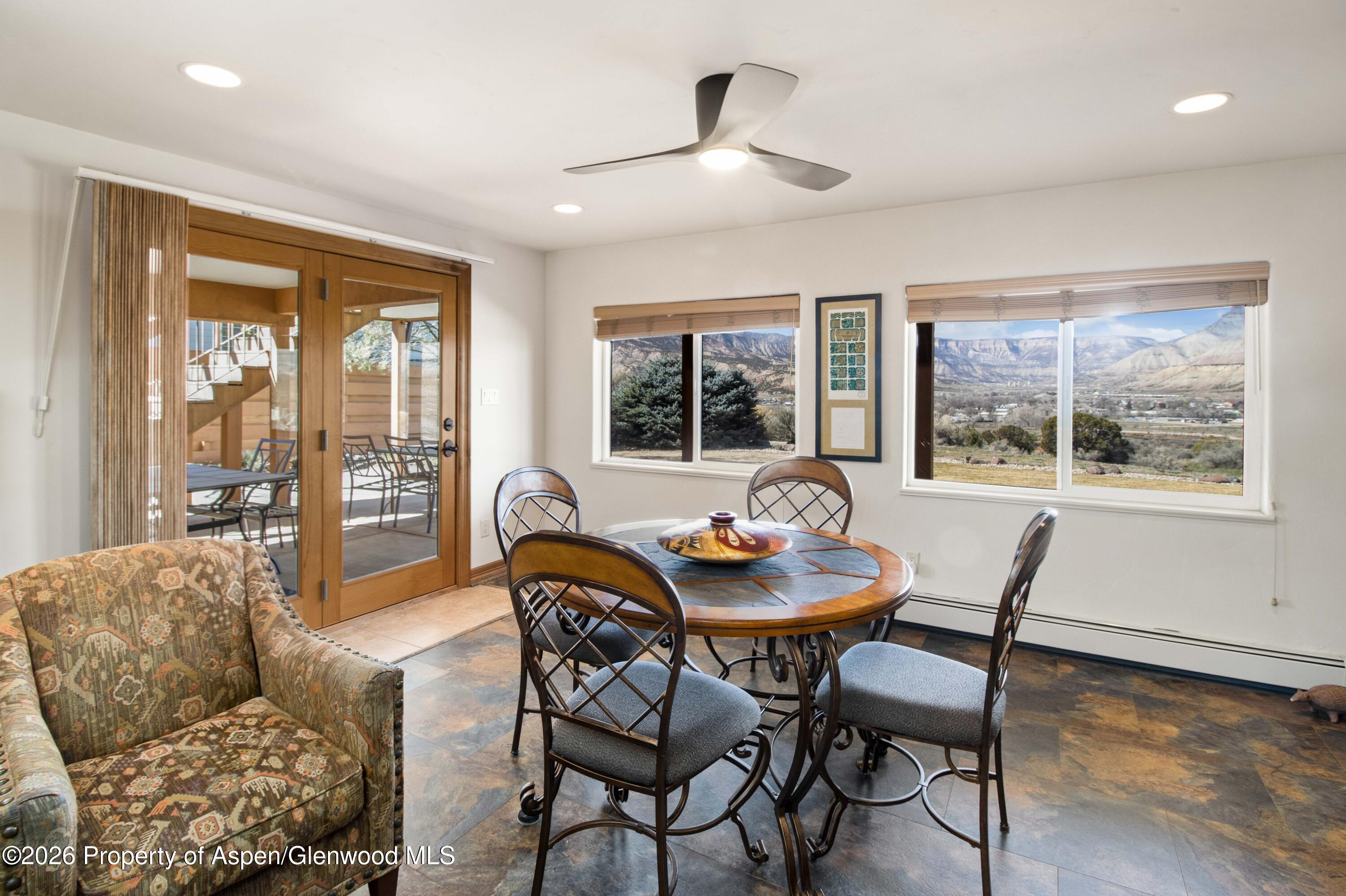 71 River View Place Parachute, CO 81635 - Photo 25 of 45 a dining room with furniture and wooden floor