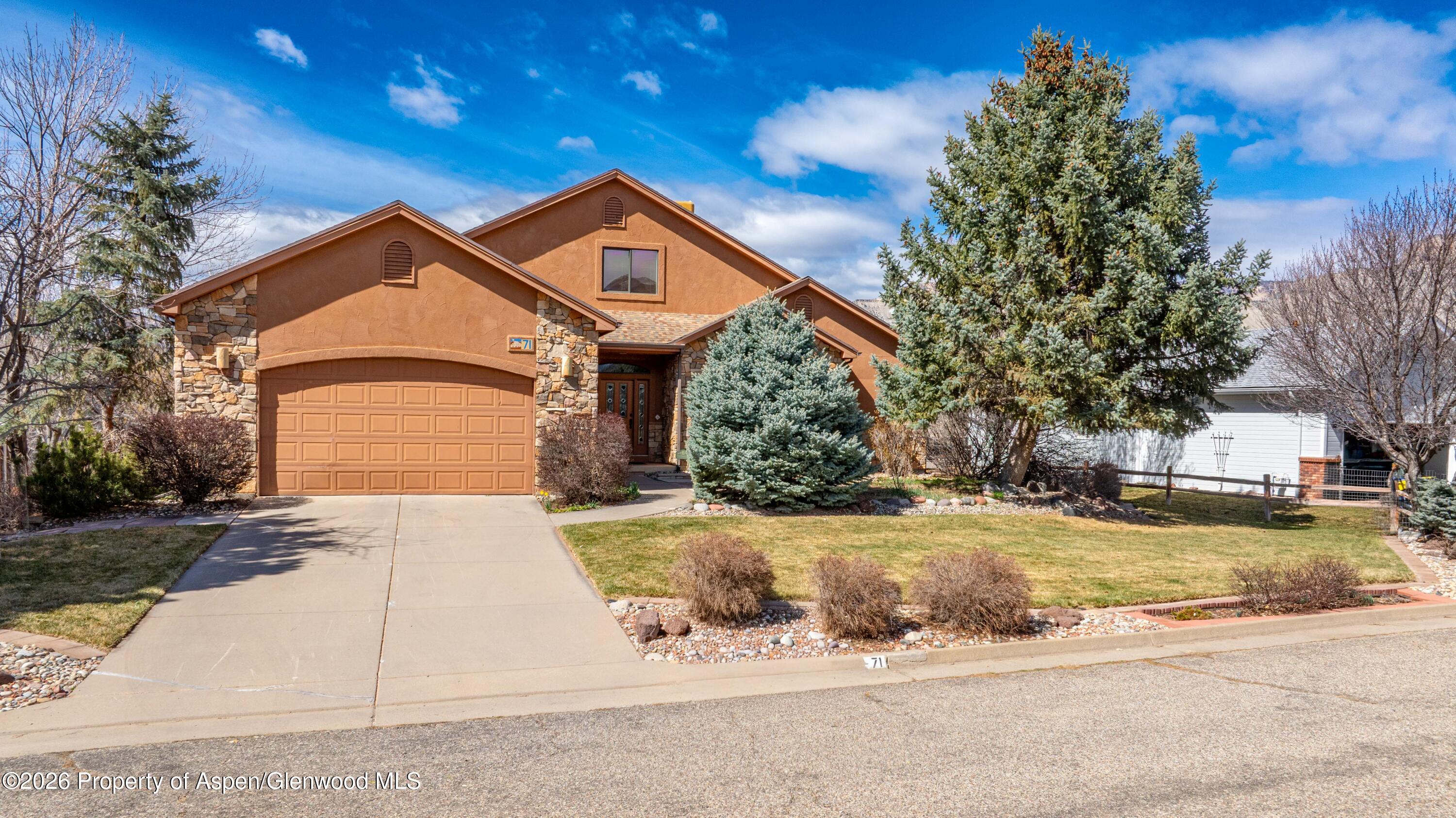 71 River View Place Parachute, CO 81635 - Photo 44 of 45 a front view of a house with a yard