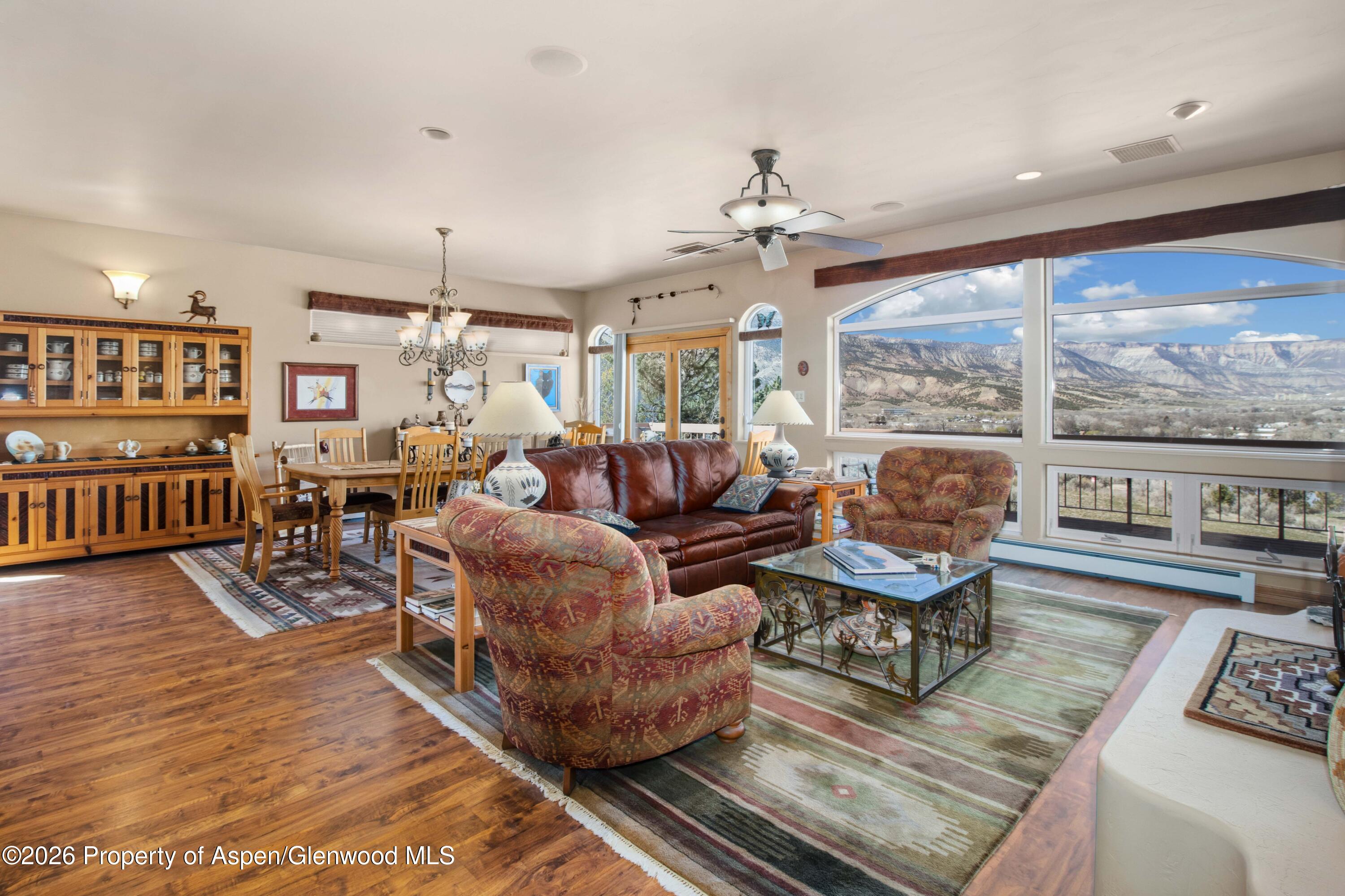 71 River View Place Parachute, CO 81635 - Photo 6 of 45 a living room with furniture and a flat screen tv