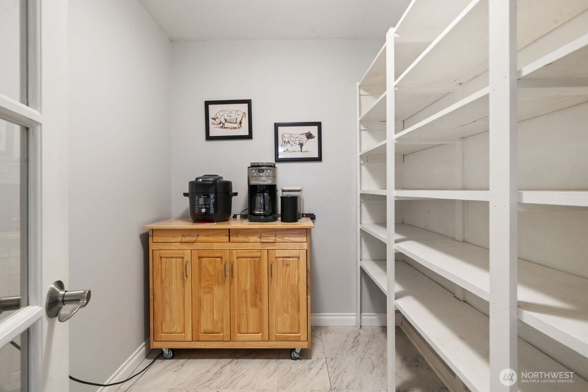 560 Mountain Trail Road Brinnon, WA 98320 - Photo 12 of 40 a room with a closet and wooden floor