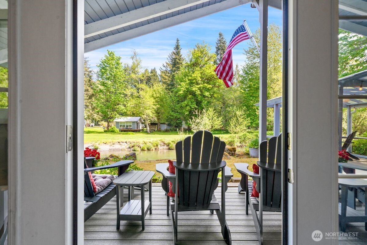 560 Mountain Trail Road Brinnon, WA 98320 - Photo 19 of 40 a view of back yard from a dining room