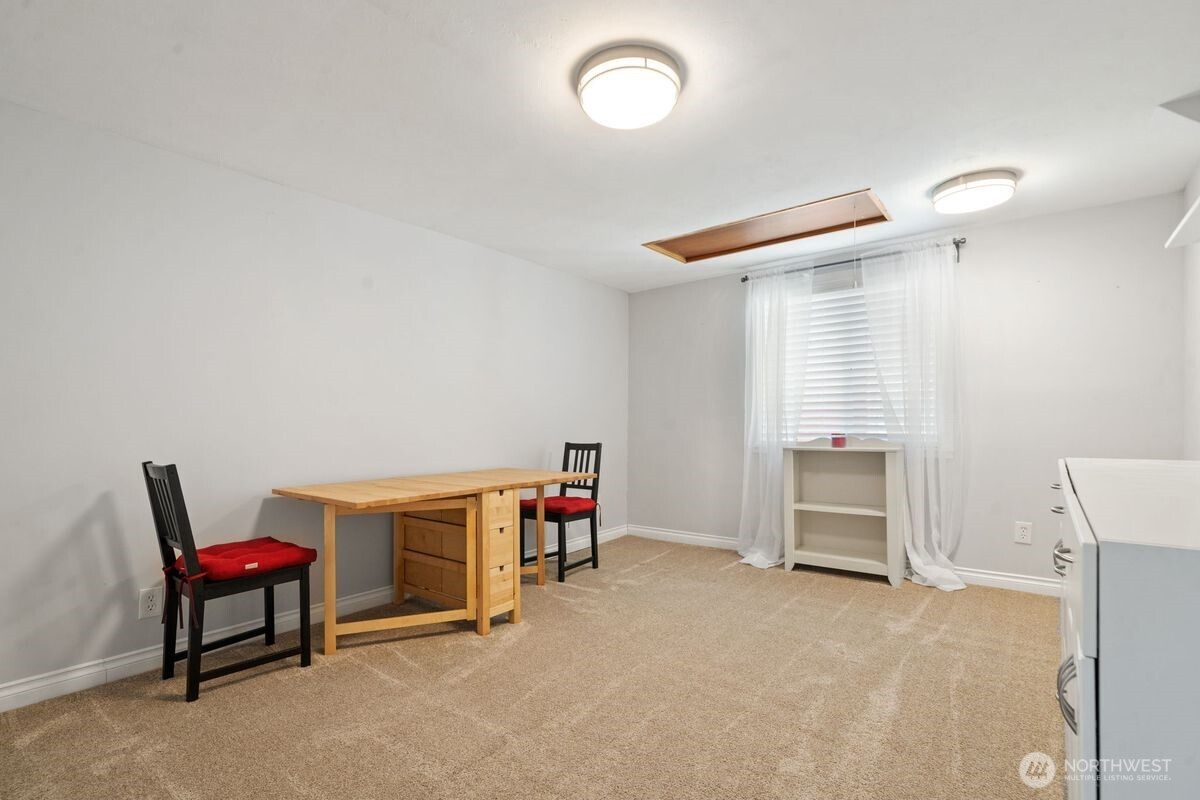 560 Mountain Trail Road Brinnon, WA 98320 - Photo 22 of 40 a view of a room with music instruments