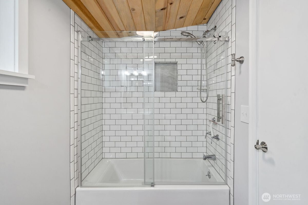 560 Mountain Trail Road Brinnon, WA 98320 - Photo 26 of 40 a bathroom with a shower