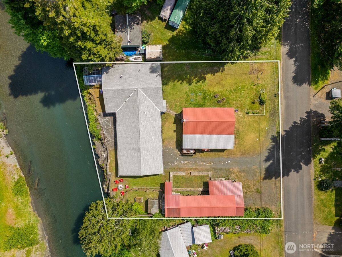 560 Mountain Trail Road Brinnon, WA 98320 - Photo 6 of 40 an aerial view of a house with swimming pool