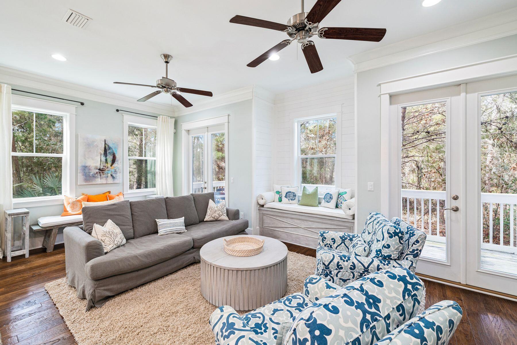 167 Milestone Drive, Unit A Inlet Beach, FL 32461 - Photo 13 of 29 a living room with furniture and a large window