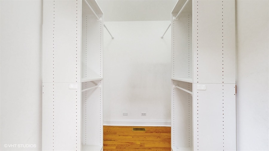 240 Hibbard Road Wilmette, IL 60091 - Photo 18 of 42 a view of a bathroom with a bathtub