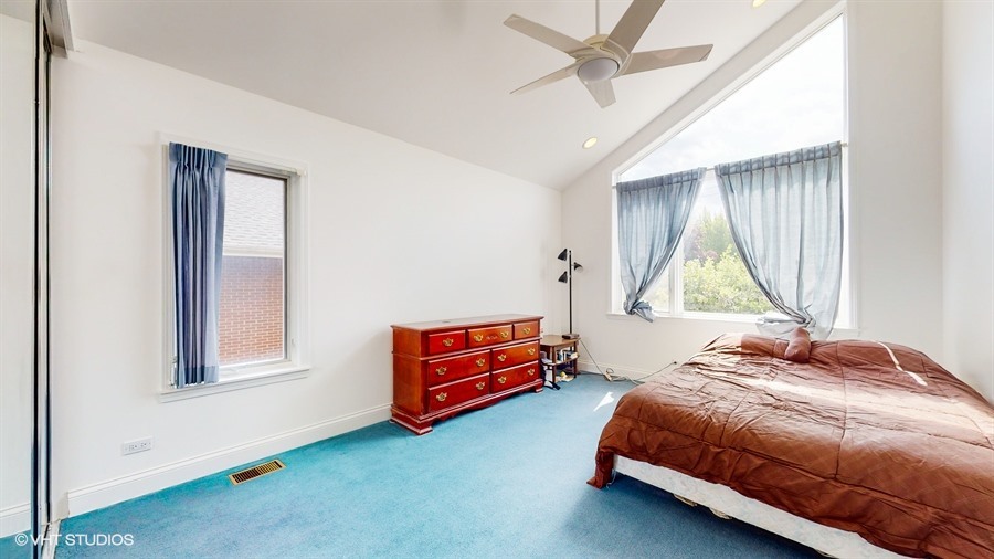 240 Hibbard Road Wilmette, IL 60091 - Photo 24 of 42 a bedroom with a bed and a window
