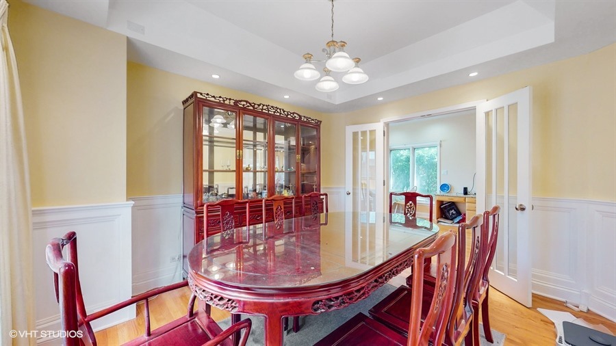240 Hibbard Road Wilmette, IL 60091 - Photo 7 of 42 a dining room with furniture and window