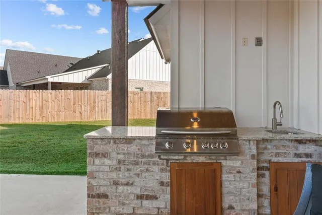 a view of a house with a back yard