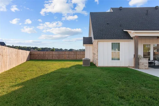 a view of a backyard with a garden
