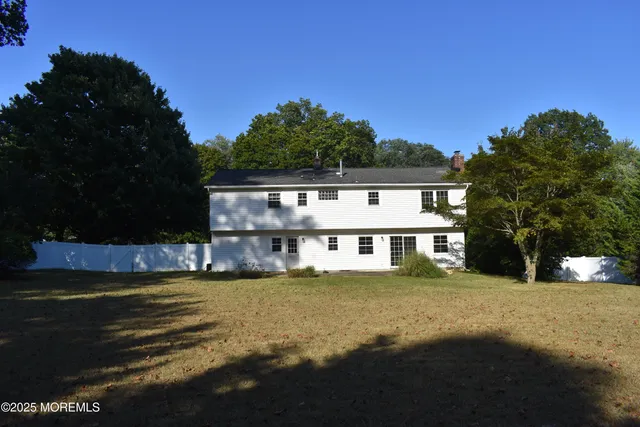 a view of a house with a big yard