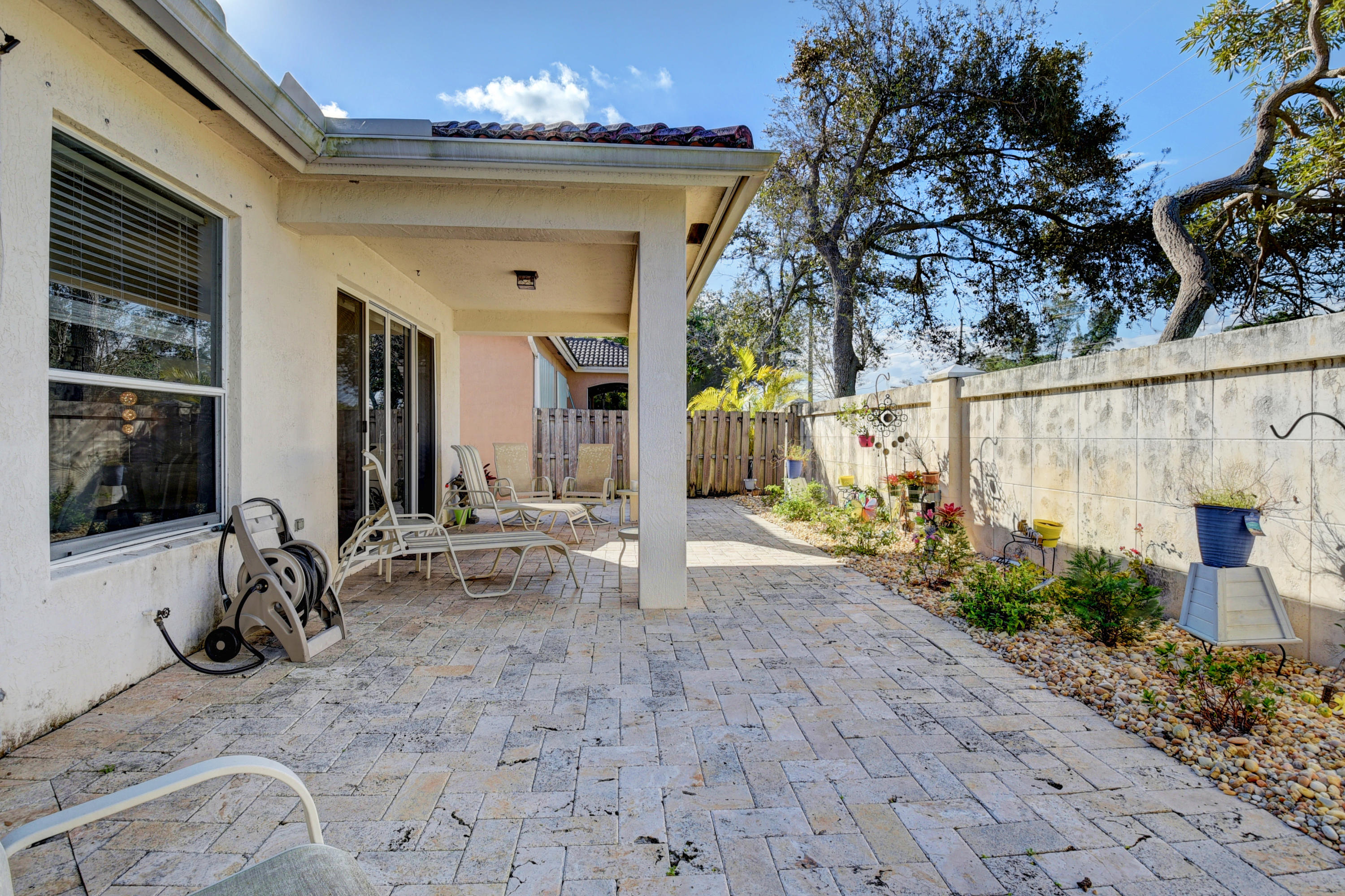 9652 Vineyard Court Boca Raton, FL 33428 - Photo 23 of 27 9652 Vineyard Ct back patio side view cl