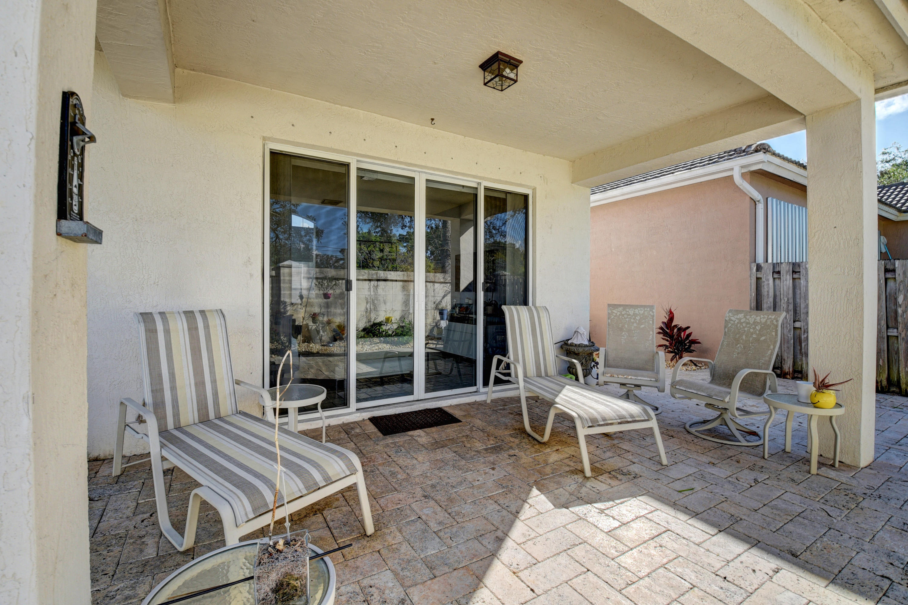 9652 Vineyard Court Boca Raton, FL 33428 - Photo 25 of 27 9652 Vineyard Ct patio to house