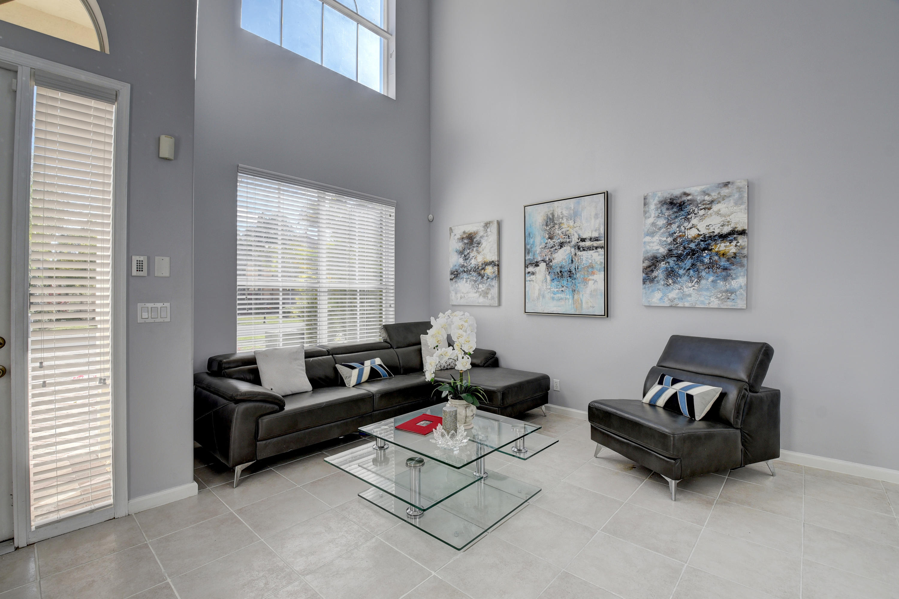 9652 Vineyard Court Boca Raton, FL 33428 - Photo 4 of 27 9652 Vineyard Ct Enter.jpg side couch