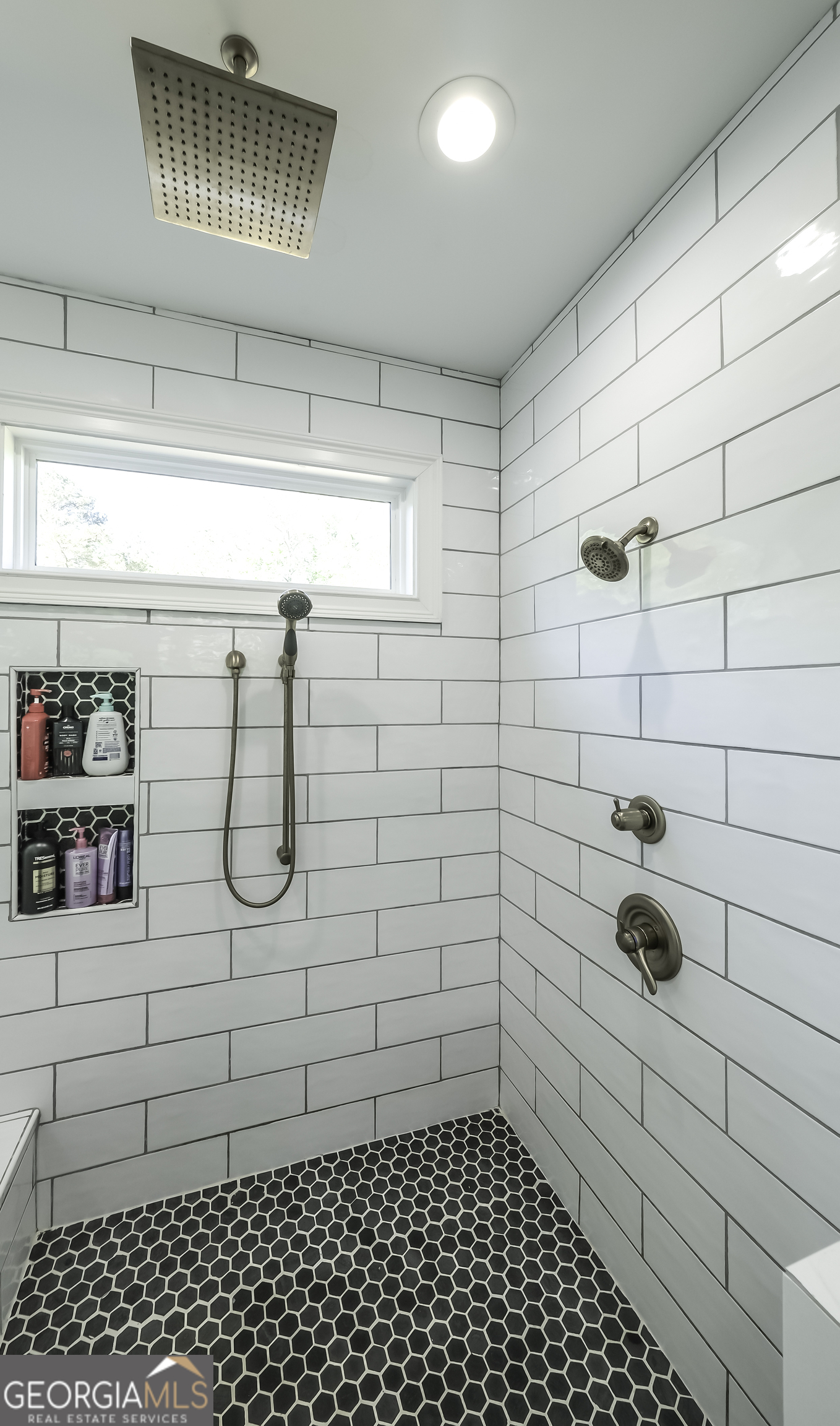 2392 Welcome Road Roopville, GA 30170 - Photo 40 of 43 a bathroom with a shower