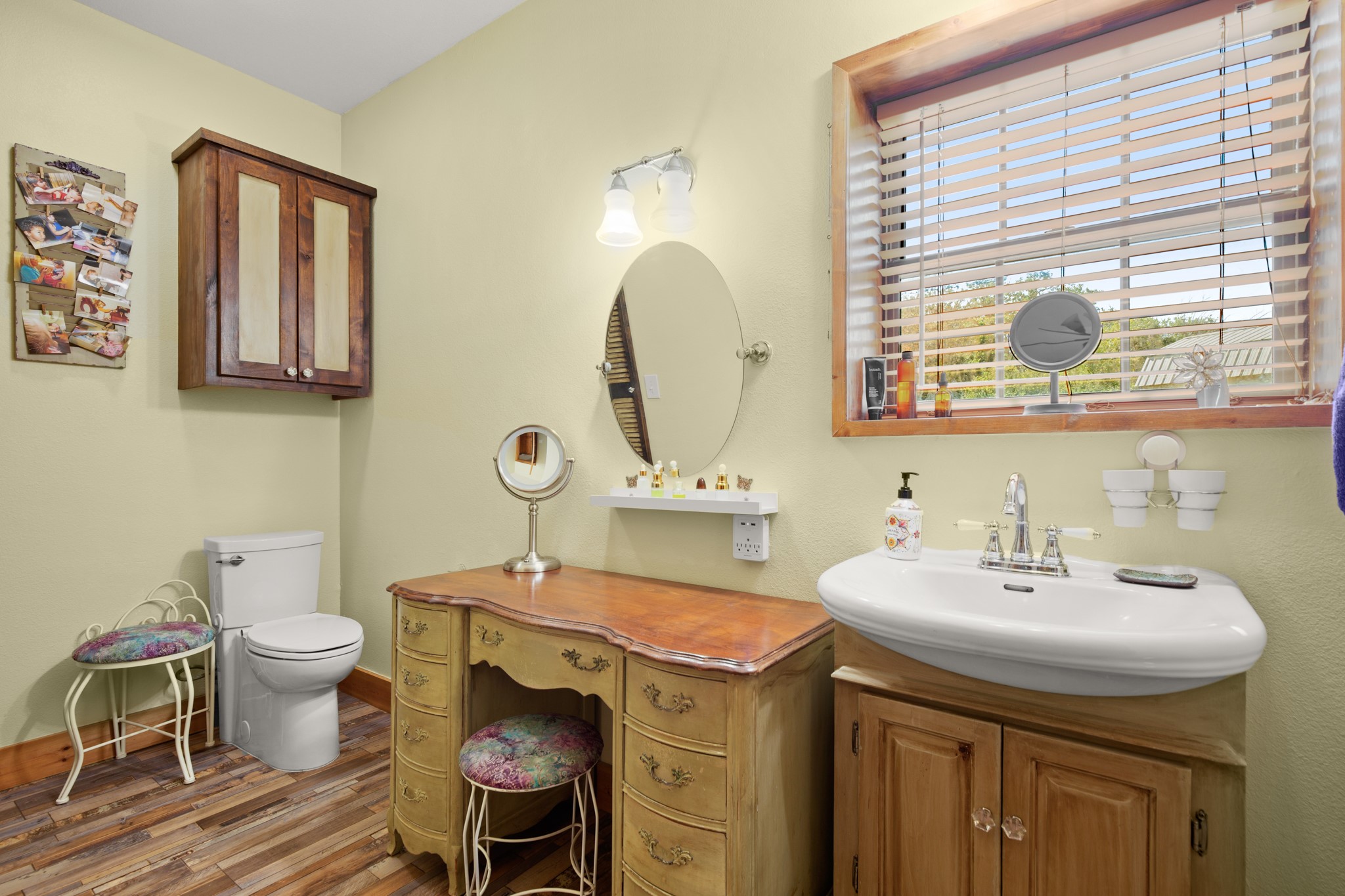 320 Pecan 3 Florence, TX 76527 - Photo 27 of 40 a bathroom with a sink and a mirror
