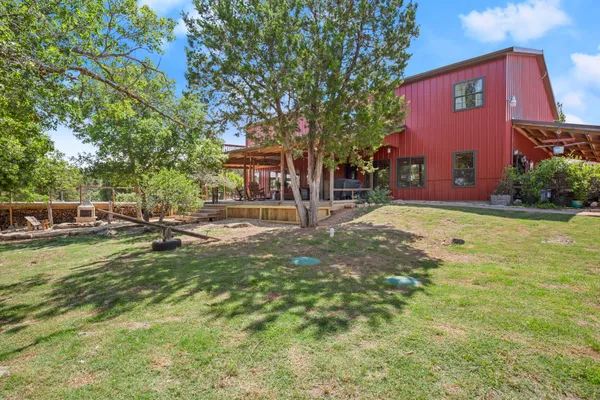 an aerial view of a house with a garden