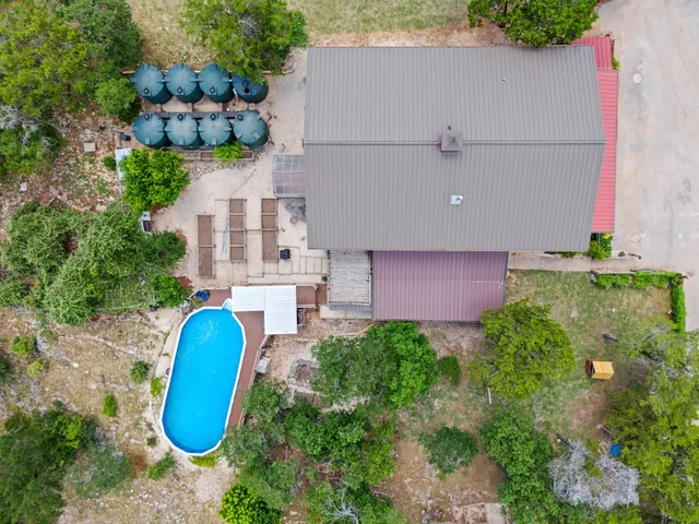 a view of swimming pool from a balcony
