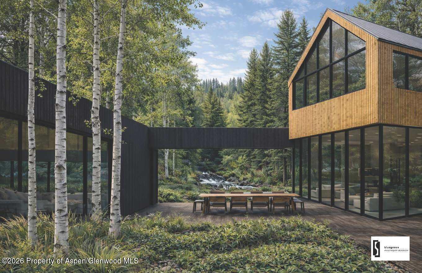 645 Sneaky Lane Aspen, CO 81611 - Photo 3 of 31 a backyard of a house with lots of green space