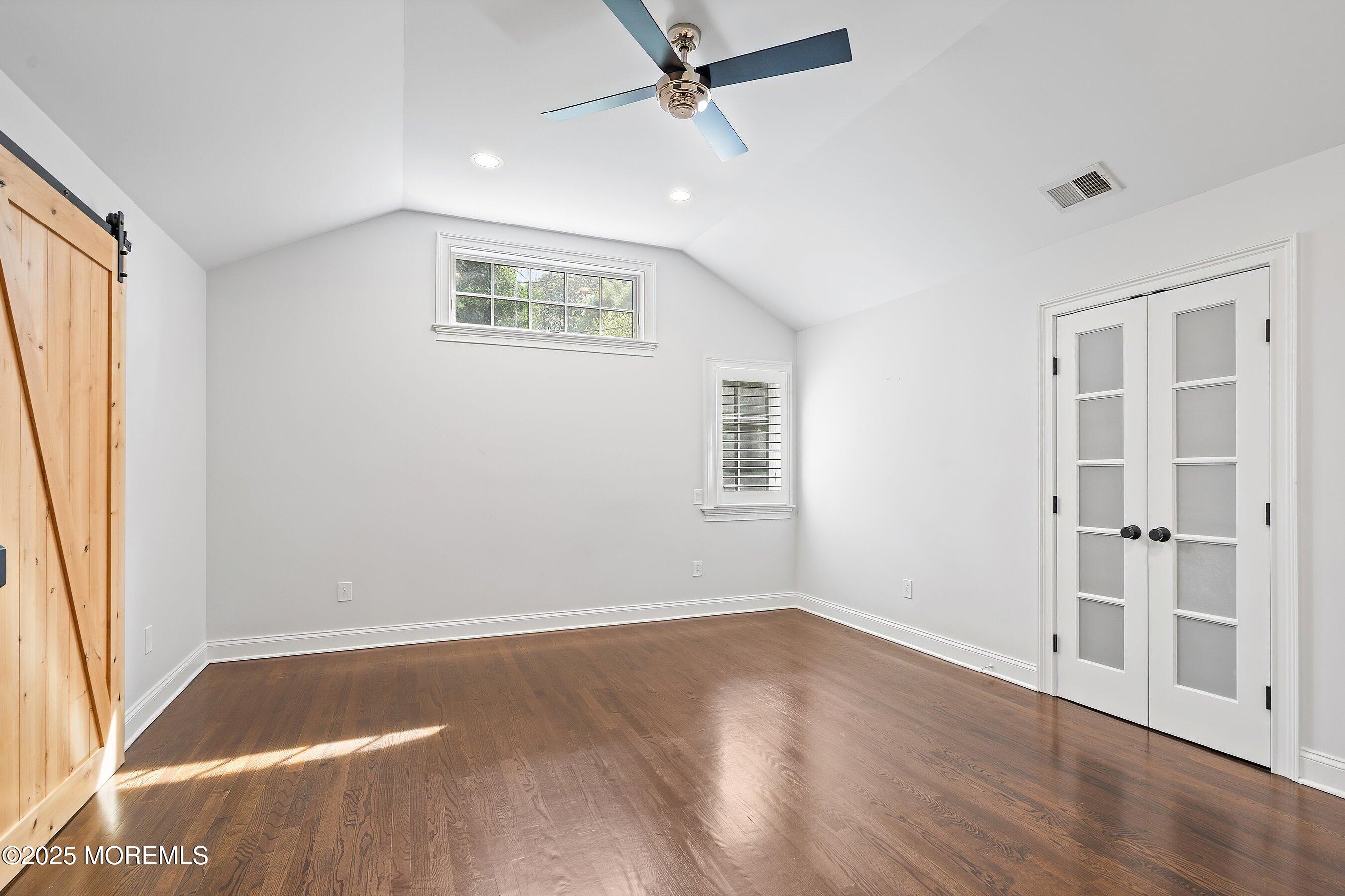 20 Rustic Terrace Fair Haven, NJ 07704 - Photo 16 of 40 an empty room with wooden floor and windows