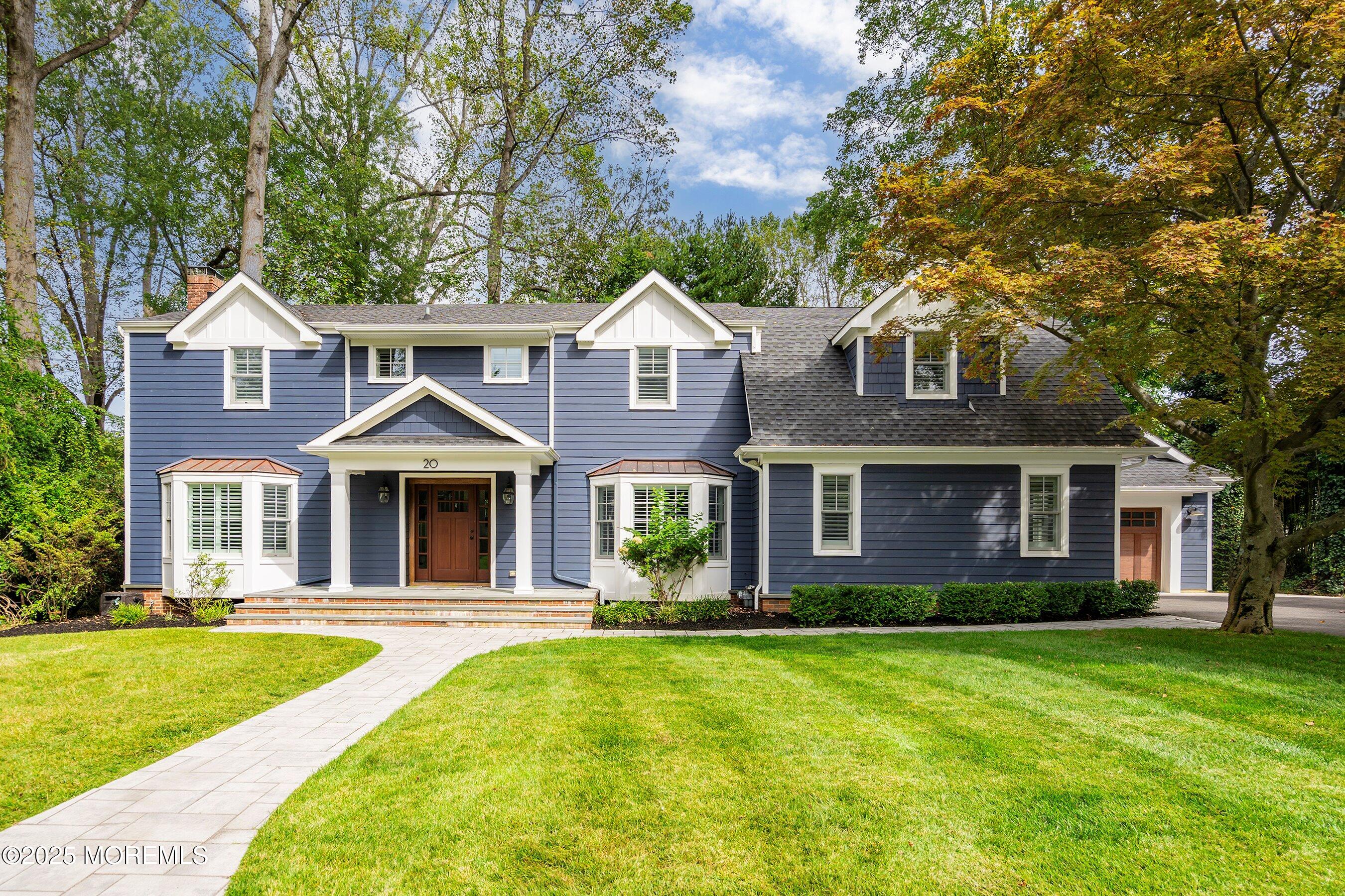 20 Rustic Terrace Fair Haven, NJ 07704 - Photo 22 of 40 a front view of a house with a yard