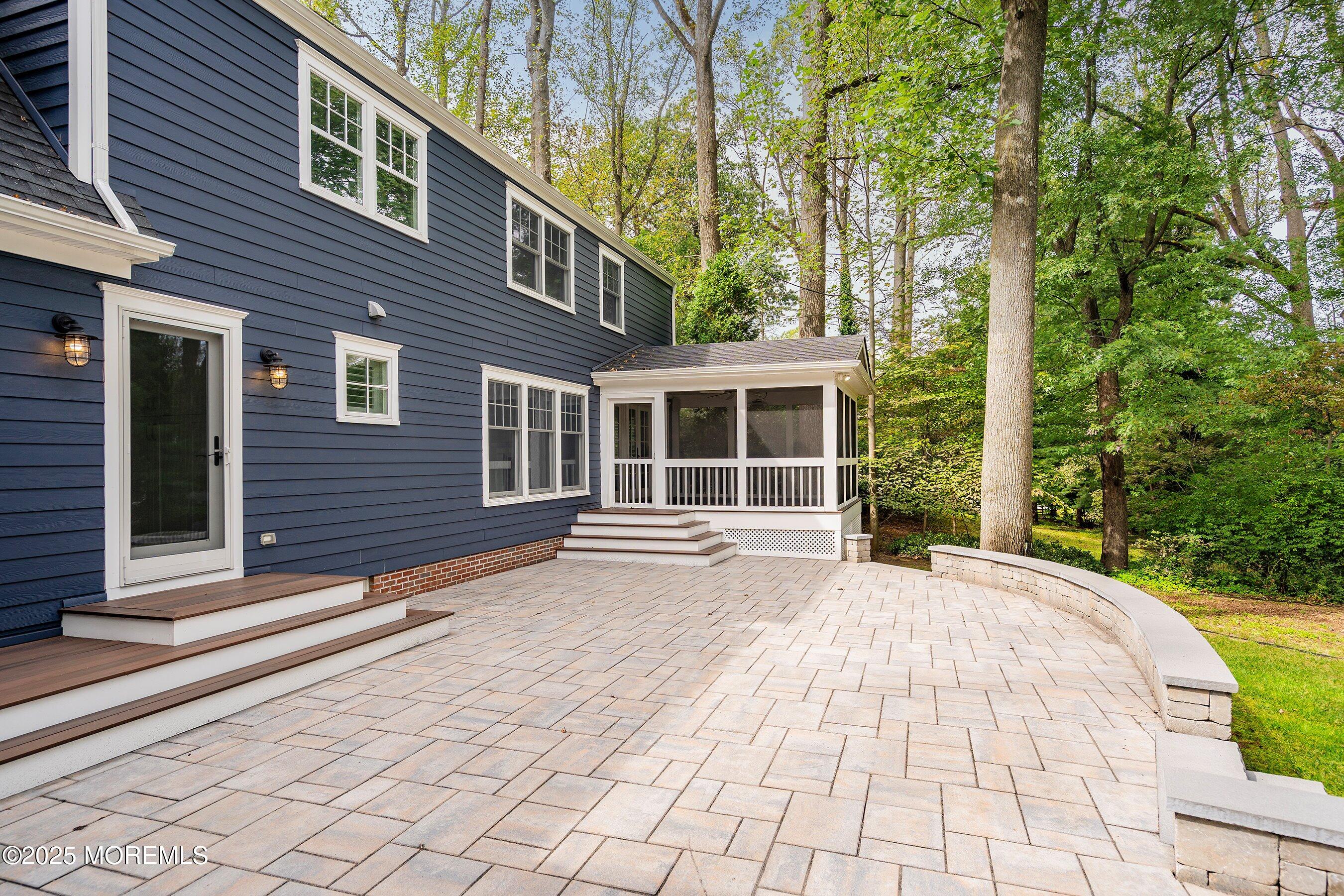 20 Rustic Terrace Fair Haven, NJ 07704 - Photo 33 of 40 a front view of a house with a yard and potted plants
