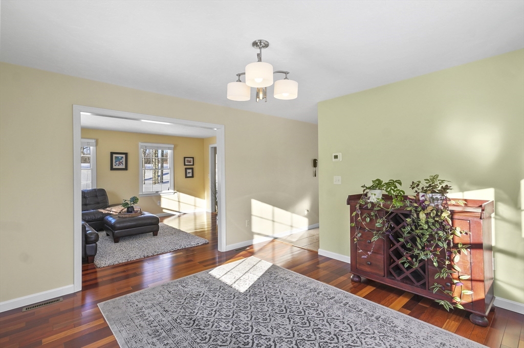 56 Glenwood Road Rutland, MA 01543 - Photo 11 of 41 a living room with furniture and a wooden floor
