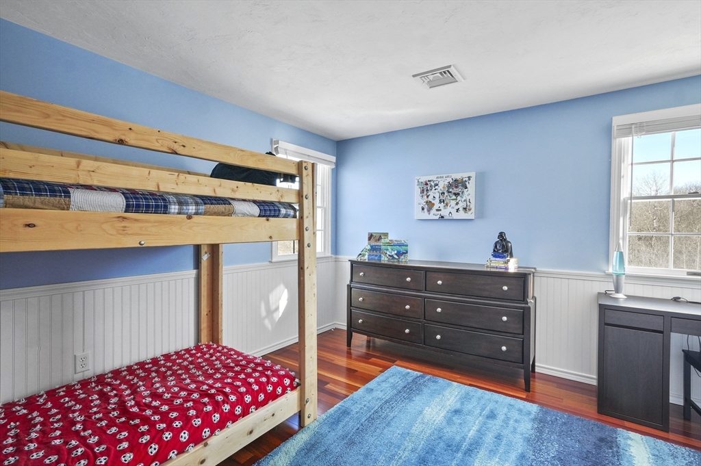 56 Glenwood Road Rutland, MA 01543 - Photo 22 of 41 a bedroom with a bed and a dresser