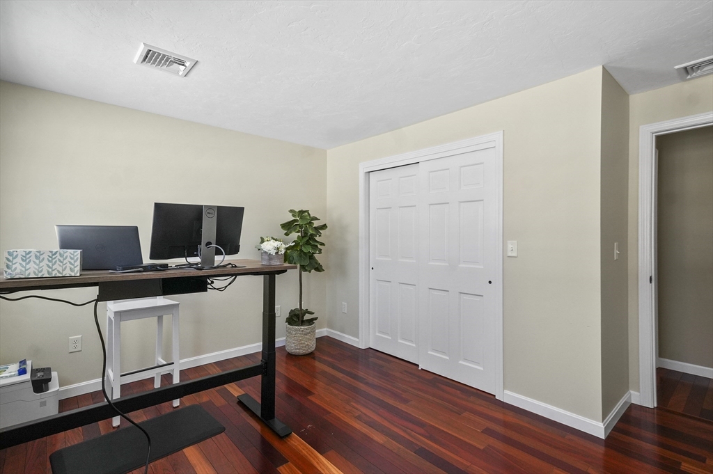 56 Glenwood Road Rutland, MA 01543 - Photo 25 of 41 a view of a workspace with furniture and wooden floor