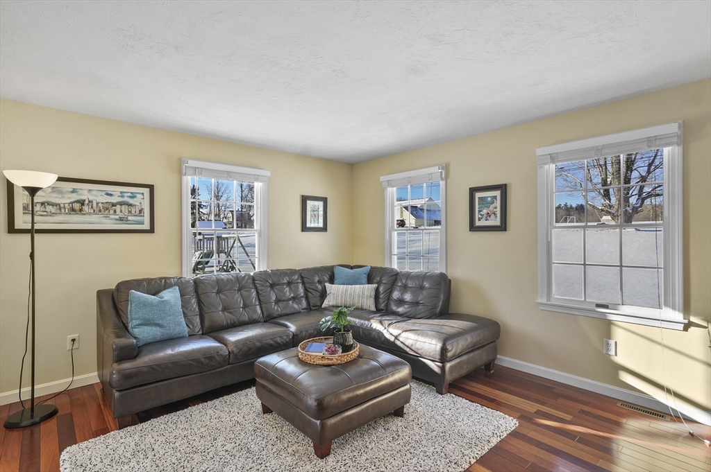 56 Glenwood Road Rutland, MA 01543 - Photo 3 of 41 a living room with furniture and a window