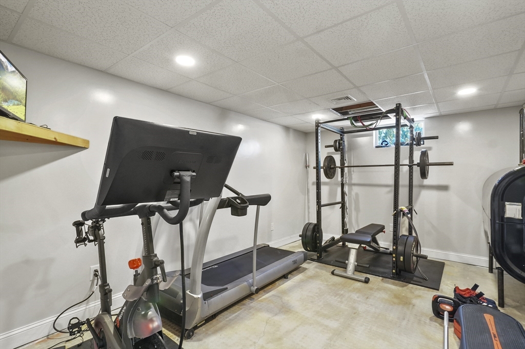 56 Glenwood Road Rutland, MA 01543 - Photo 31 of 41 a view of a room with gym equipment