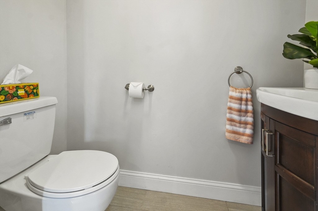 56 Glenwood Road Rutland, MA 01543 - Photo 32 of 41 a bathroom with a toilet and a mirror