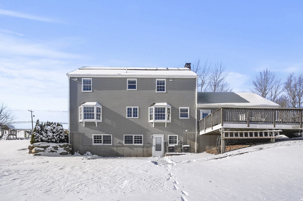 56 Glenwood Road Rutland, MA 01543 - Photo 35 of 41 a front view of a house with a yard