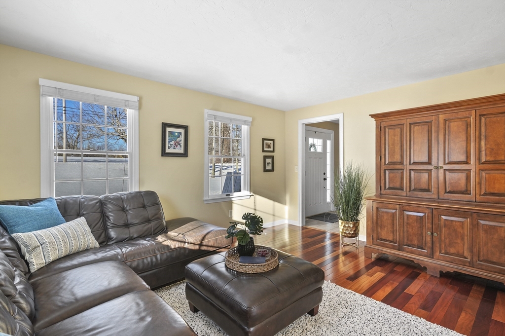 56 Glenwood Road Rutland, MA 01543 - Photo 4 of 41 a living room with furniture and wooden floor