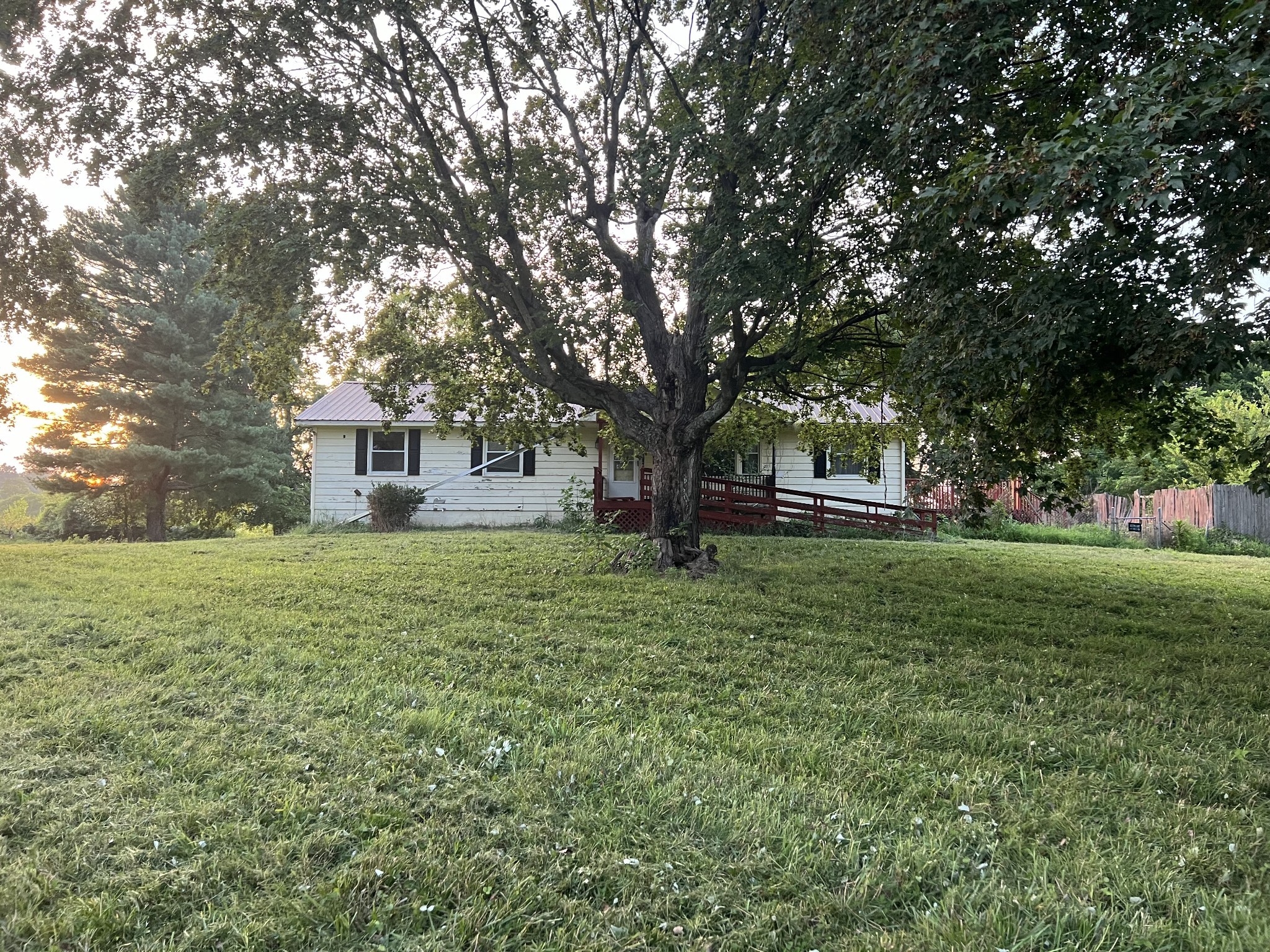 7569 Greenwood Road Cross Plains, TN 37049 - Photo 16 of 16 a view of a house with a yard
