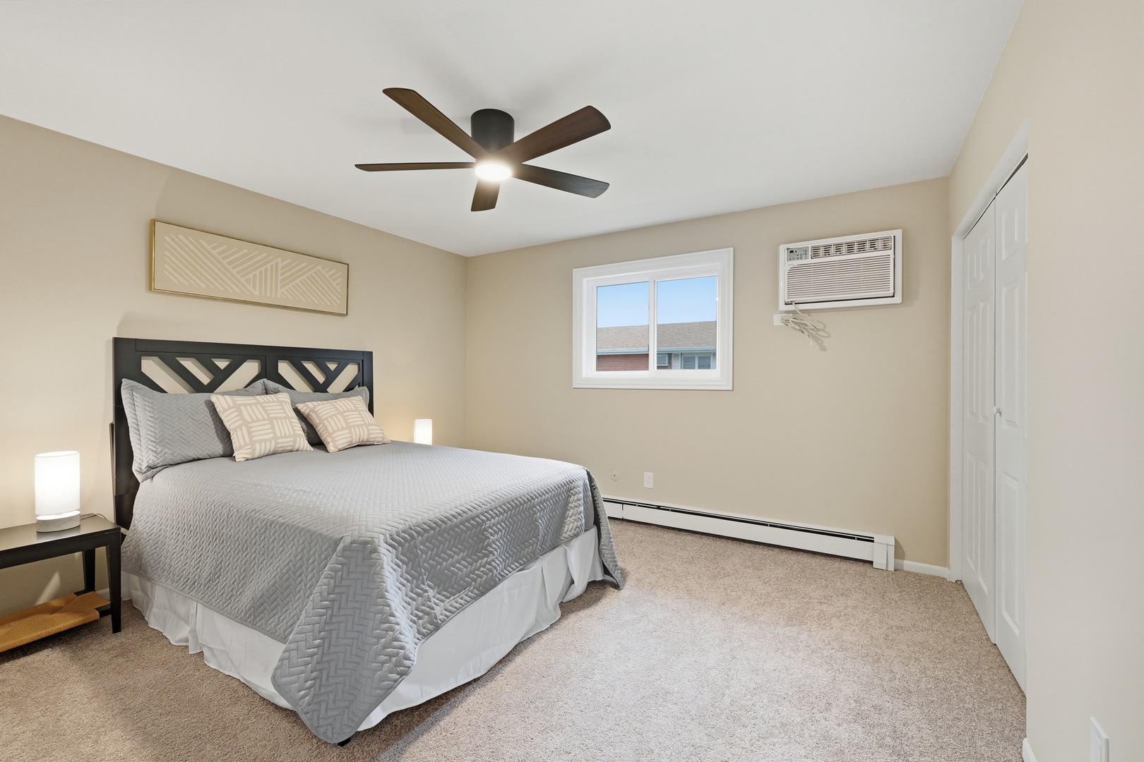 1231 Town Crest Drive, Unit E New Lenox, IL 60451 - Photo 8 of 15 a bedroom with a bed and window