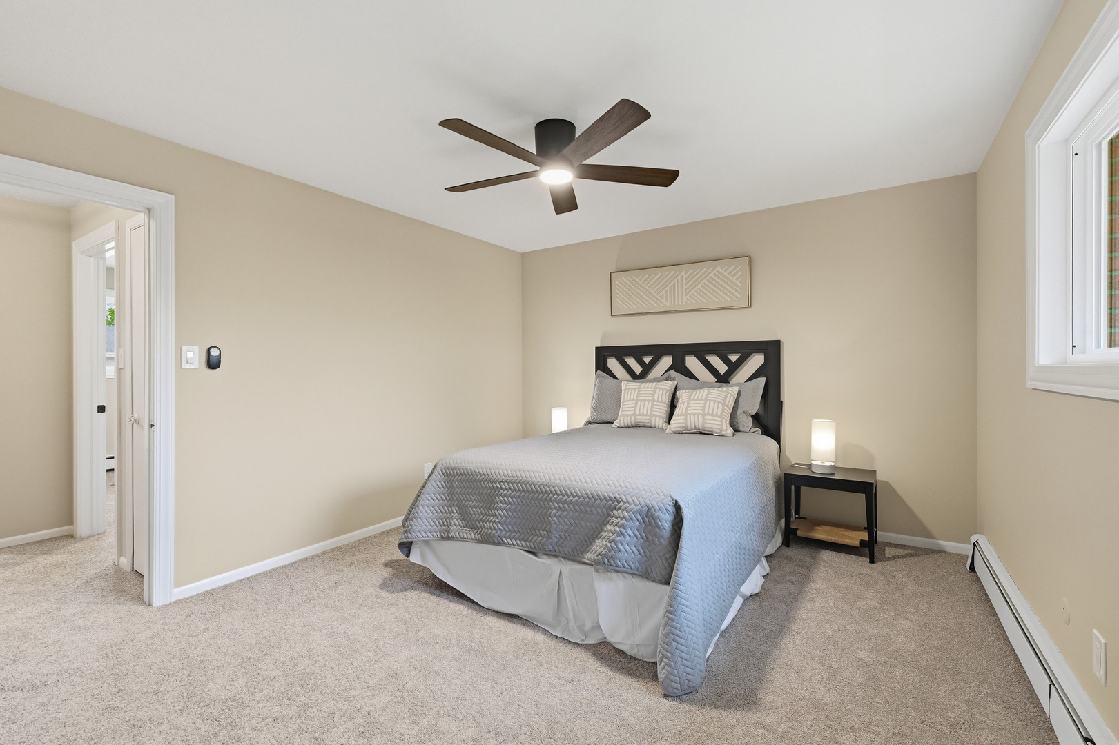 1231 Town Crest Drive, Unit E New Lenox, IL 60451 - Photo 9 of 15 a bedroom with a bed and window