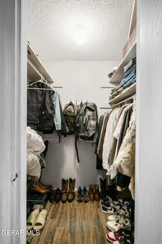 a work room with furniture and a window