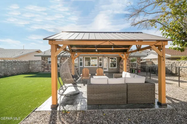 a backyard of a house with lots of tree