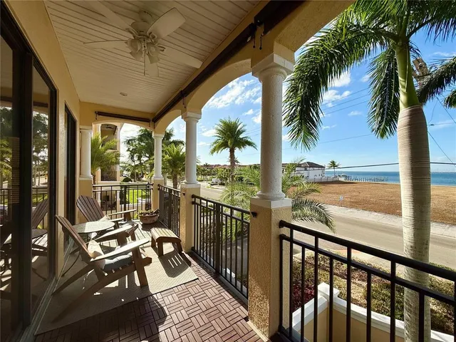 a view of a balcony with ocean view