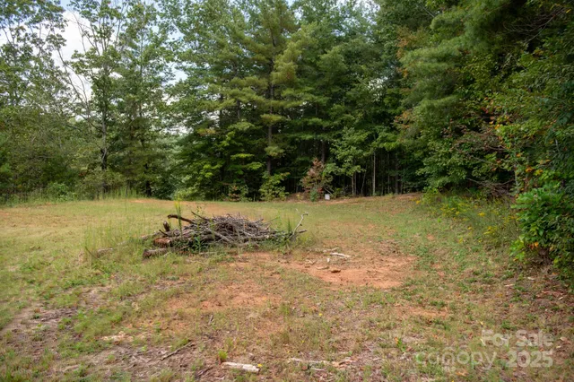 a view of a field with an outdoor space
