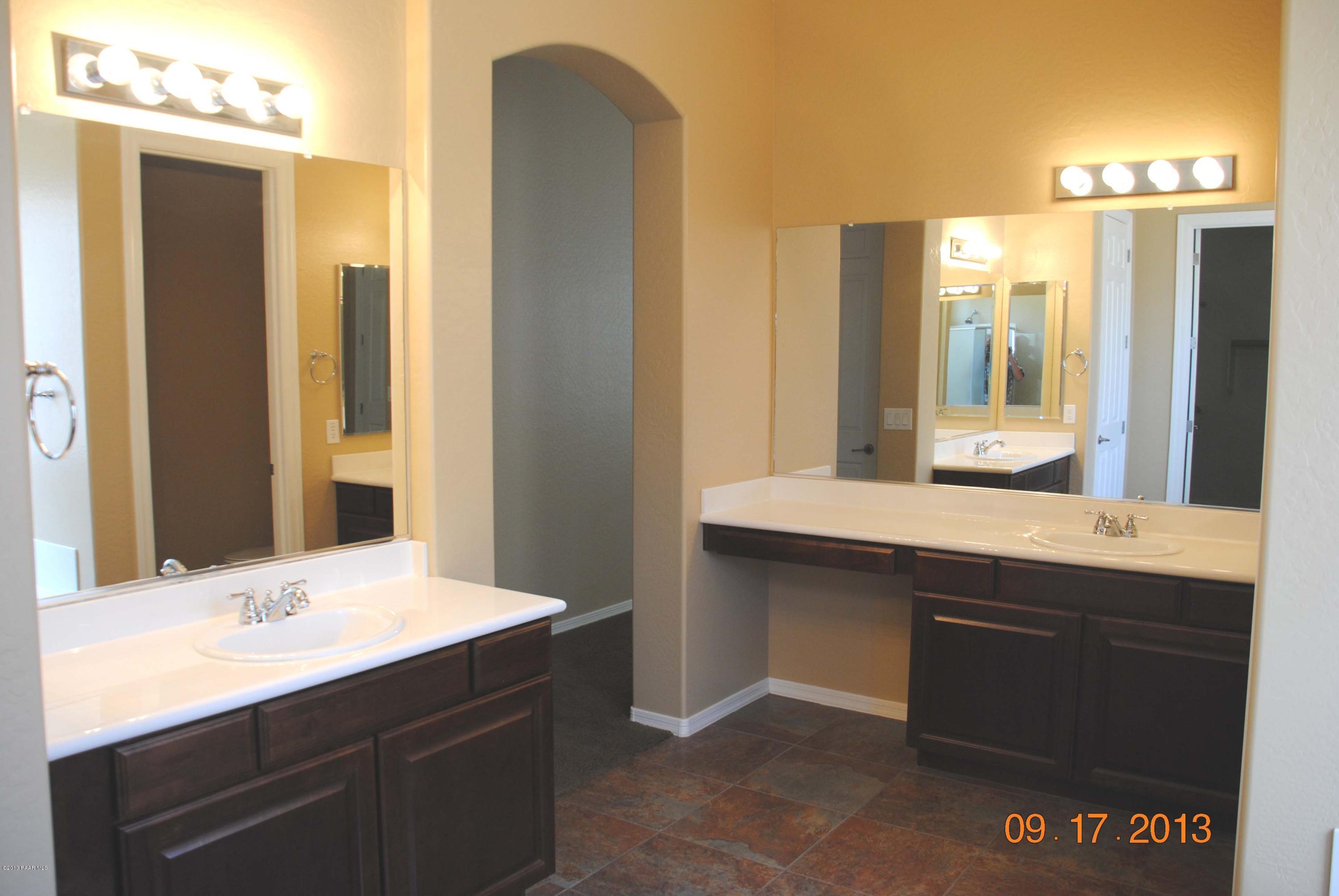 7906 East Mesteno Road Prescott Valley, AZ 86315 - Photo 13 of 24 a bathroom with a sink and a mirror
