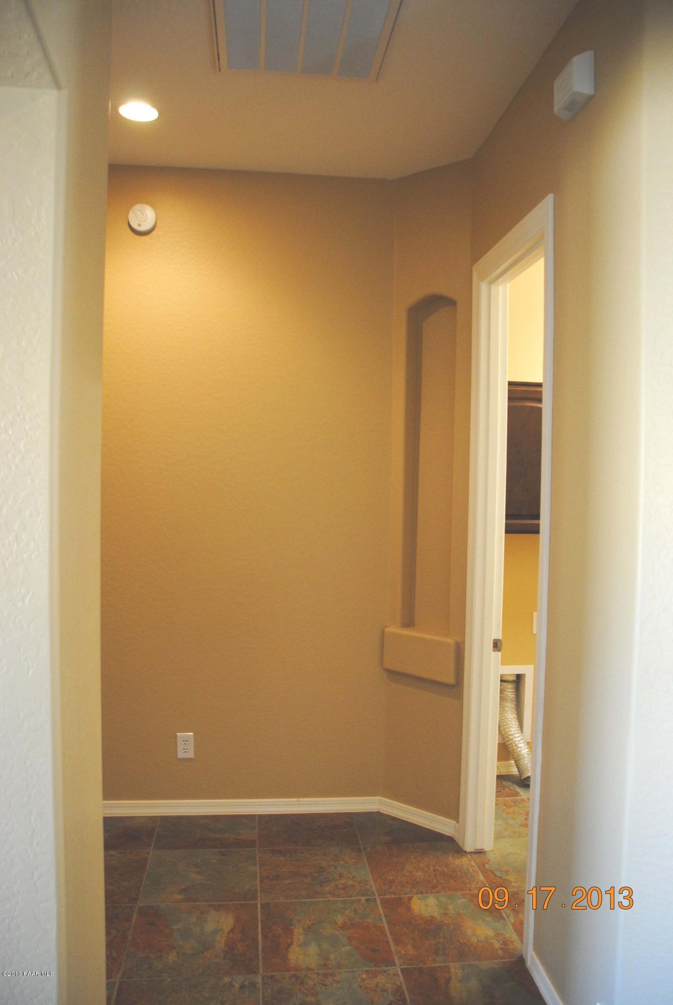 7906 East Mesteno Road Prescott Valley, AZ 86315 - Photo 15 of 24 an empty room with windows
